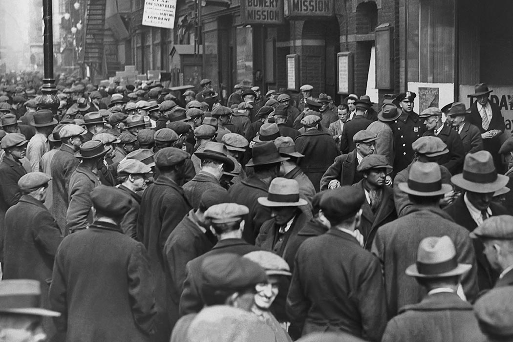 A crowded city street at the turn of the century