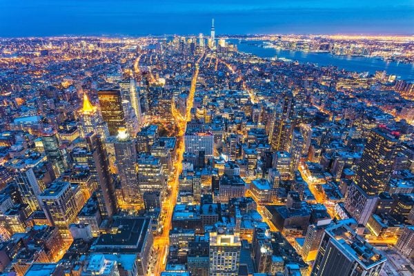 Bird's eye view of a busy and lit up city