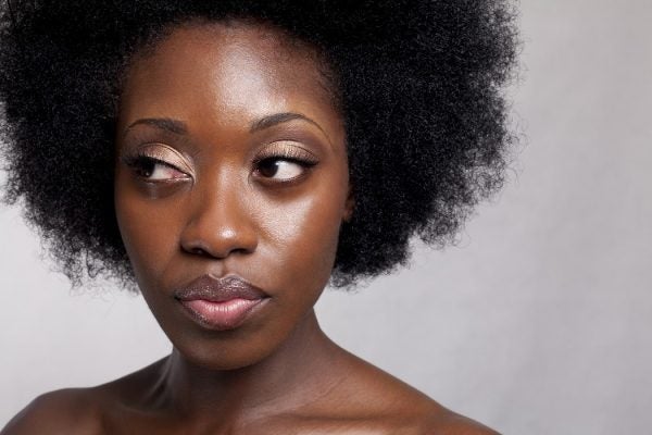 Close-up of a woman with natural hair