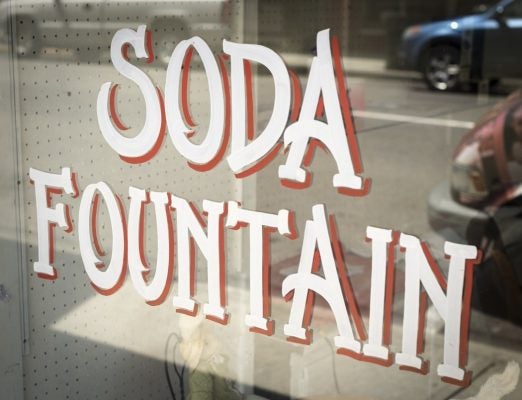 "Soda Fountain" painted on the front of a store