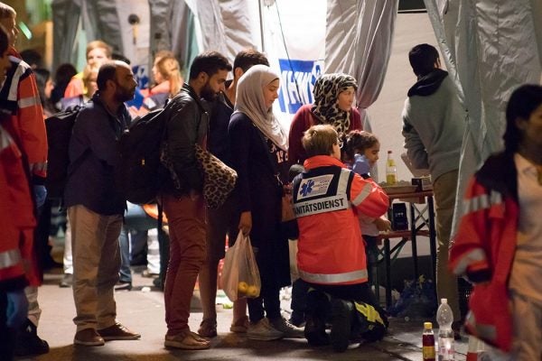 A refugee family seen arrives at the Munich railway station before being checked by the medical staffs. - Thousands of refugees mainly from Iraq and Syria continue to flood in to Munich railway station in southern Germany as trains arrive from Budapest and Vienna. 8th September 2015 (Photo by Geovien So/NurPhoto)

Credit: Associated Press