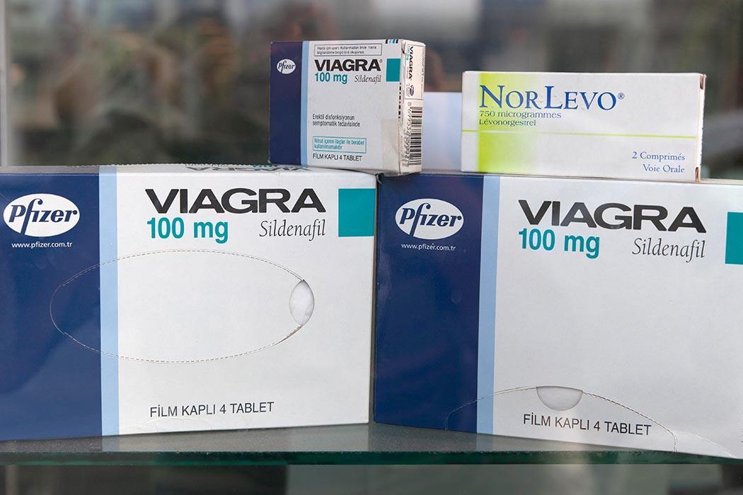 October 15, 2009: Viagra and Norlevo tablets in window display of a a pharmacy in Kas, Turkey. Viagra is made by Pfizer Pharmaceuticals and the trade name for the drug sildenafil citrate. It is the prime treatment for erectile dysfunction. It was developed 1998 by british scientists for treating pulmonary arterial hypertension. Norlevo is a hormonal contraceptive.