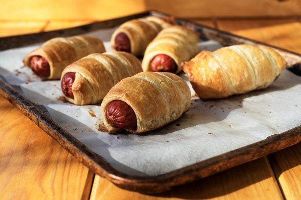 A tray of pigs in a blanket.