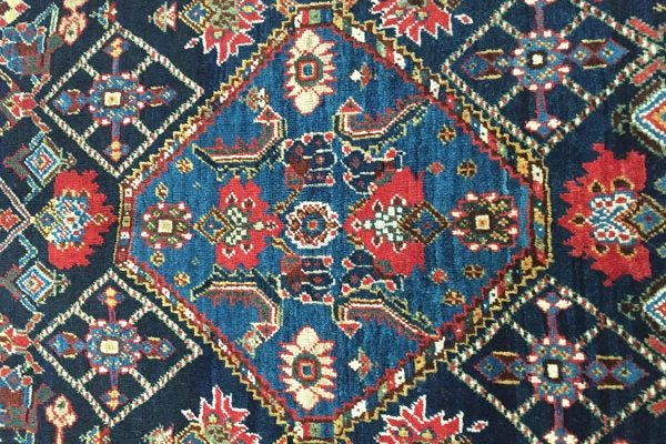 Central medallion of a Qashqai rug, 19th century, with fragmented Herati pattern.