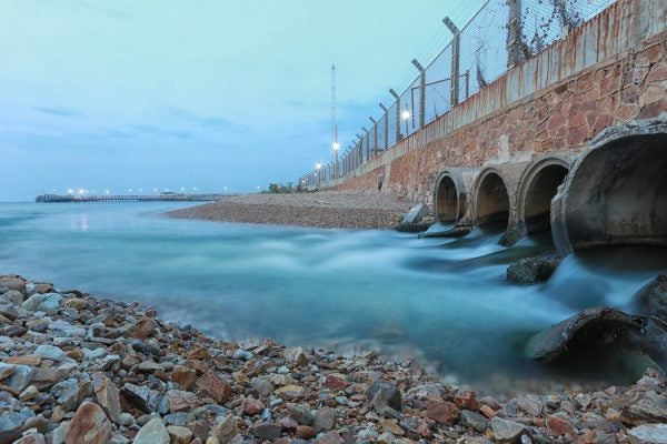 Drain pipes flowing into a bay