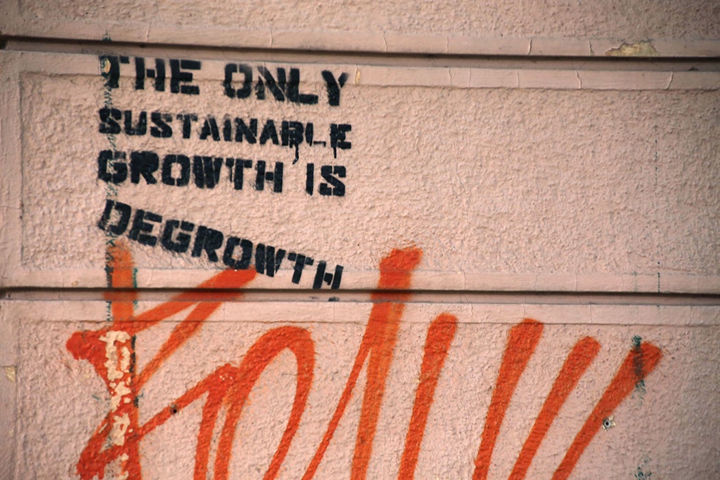 Graffiti that says "The Only Sustainable Growth is Degrowth"