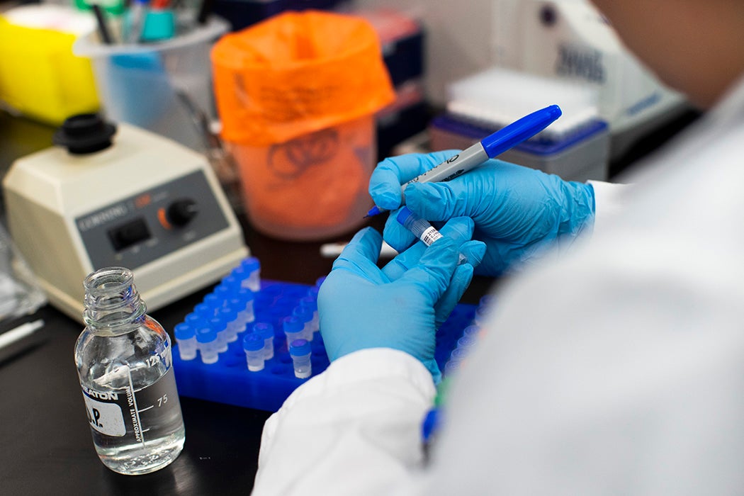 A researcher works in a lab that is developing testing for the COVID-19 coronavirus in New Jersey