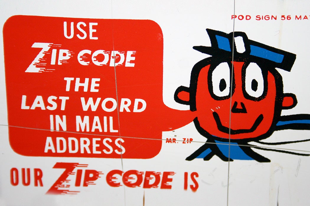 ZIP code promotional sign with "Mr. ZIP" on a hotel letter drop.