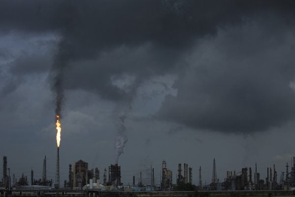 A gas flare from the Shell Chemical LP petroleum refinery illuminates the sky on August 21, 2019 in Norco, Louisiana