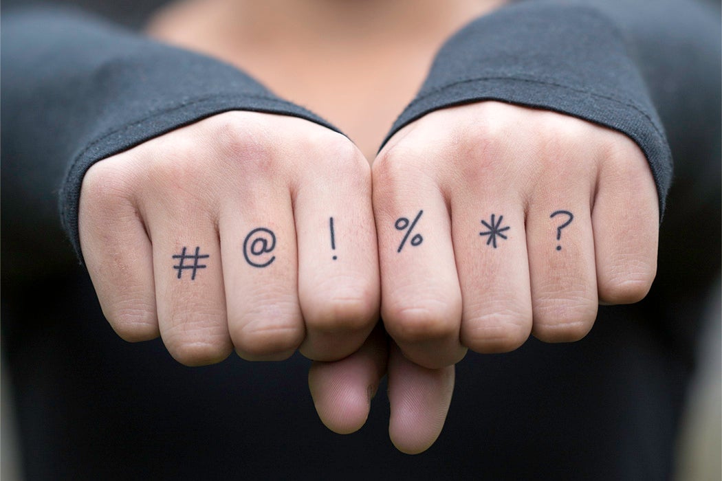 Tattoos on a person's knuckles