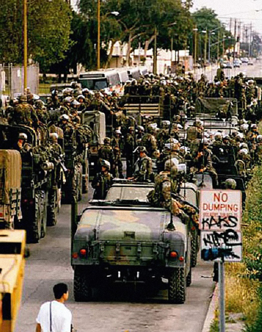 Marines disembark from their Humvees in Compton during the L.A. riots, 1992