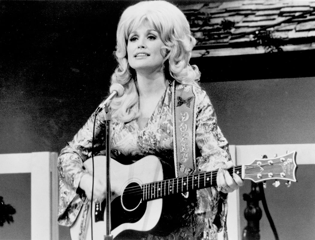 Dolly Parton performs onstage circa 1974