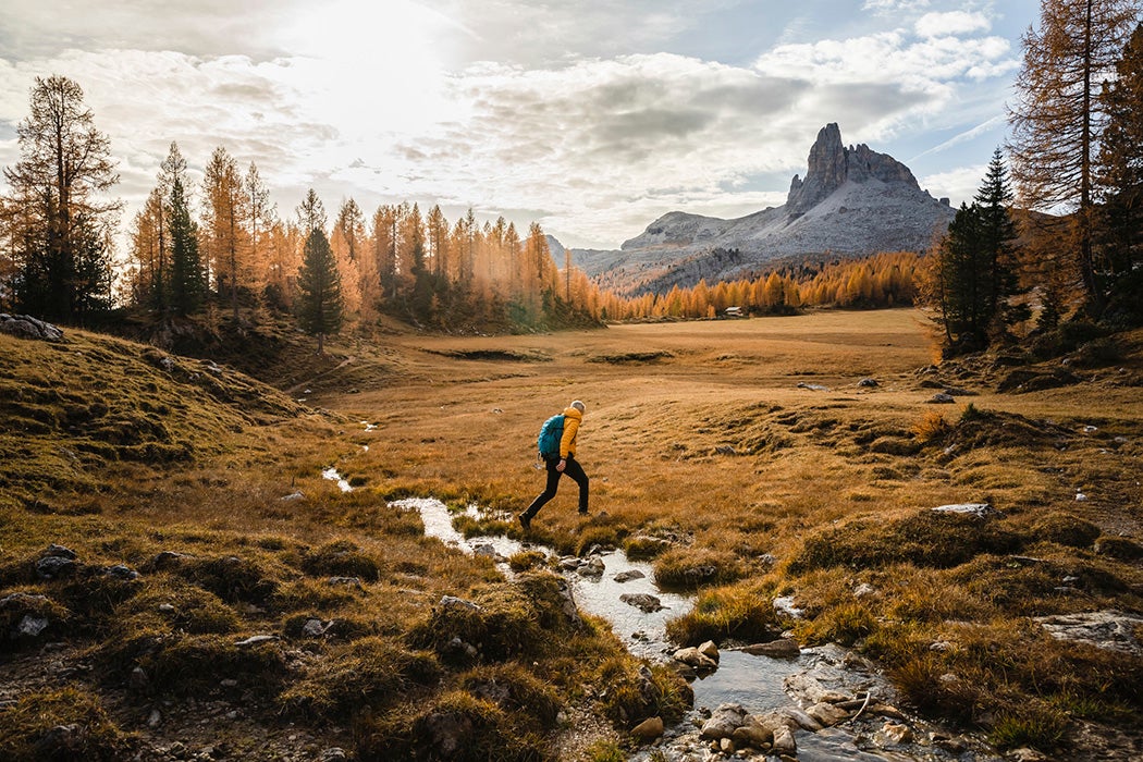 A person hiking off-trail