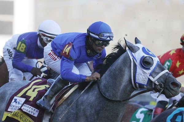 Essential Quality #14, ridden by Luis Saez, heads to the first turn during the 147th running of the Kentucky Derby at Churchill Downs on May 01, 2021 in Louisville, Kentucky.