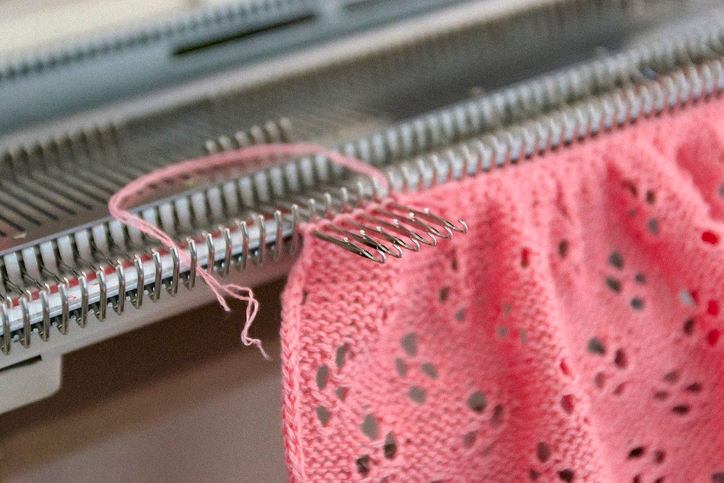 Manual knitting machine.