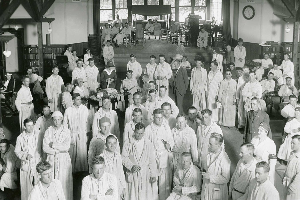 Patients stand in the Red Cross building in Walter Reed Hospital, c. WWI