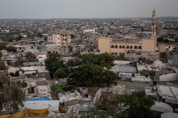 GAZA CITY, GAZA - JULY 24: A general view of the Beit Hanoun neighborhood on July 24, 2017 in Gaza City, Gaza. For the past ten years Gaza residents have lived with constant power shortages, in recent years these cuts have worsened, with supply of regular power limited to four hours a day. On June 11, 2017 Israel announced a new round of cuts at the request of the Palestinian authorities and the decision was seen as an attempt by President Mahmoud Abbas to pressure Gaza's Hamas leadership. Prior to the new cuts Gaza received 150 megawatts per day, far below it's requirements of 450 megawatts. In April, Gaza's sole power station which supplied 60 megawatts shut down, after running out of fuel, the three lines from Egypt, which provided 27 megawatts are rarely operational, leaving Gaza reliant on the 125 megawatts supplied by Israel's power plant. The new cuts now restrict electricity to three hours a day severely effecting hospital patients with chronic conditions and babies on life support. During blackout hours residents use private generators, solar panels and battery operated light sources to live. June 2017 also marked ten years since Israel began a land, sea and air blockade over Gaza. Under the blockade, movement of people and goods is restricted and exports and imports of raw materials have been banned. The restrictions have virtually cut off access for Gaza's two million residents to the outside world and unemployment rates have skyrocketed forcing many people into poverty and leaving approximately 80% of the population dependent on humanitarian aid. (Photo by Chris McGrath/Getty Images)