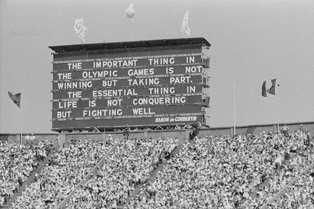 A scoreboard bearing a quote by founder of the modern olympics Pierre de Coubertin, at the opening ceremony of the Olympic Games Wembley Stadium, London, 29th July 1948. The quotation reads: 'The most important thing in the Olympic Games is not winning but taking part. The essential thing in life is not conquering but fighting well'. Original Publication: Picture Post - 4582 - Olympic Games - pub. 14th August 1948 (Photo by Haywood Magee/Picture Post/Hulton Archive/Getty Images)