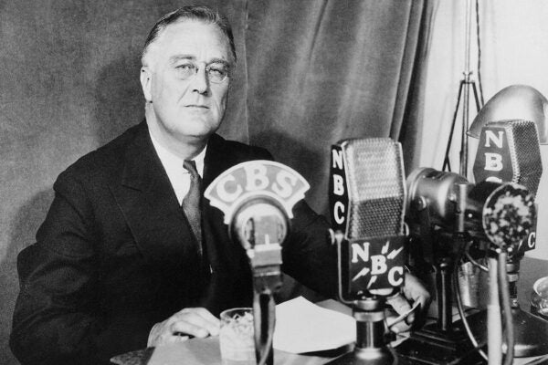 Franklin D. Roosevelt at the White House in Washington, D.C., delivering a national radio address, 1934