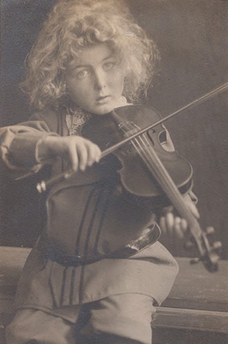 Henry Cowell playing the violin at age 5.